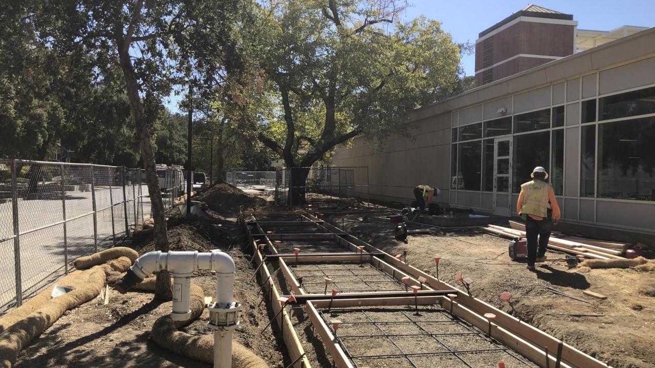 Surface restoration of sidewalks outside the Memorial Union bookstore.