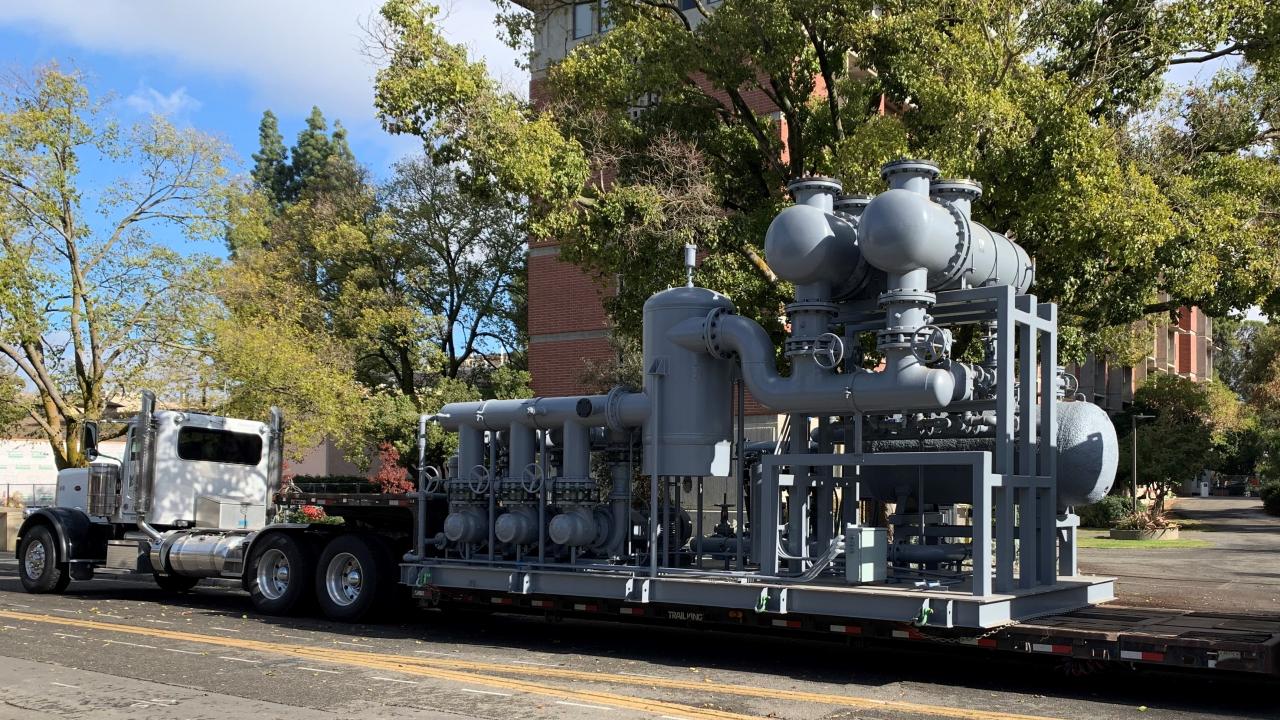 Truck hauls a heat exchanger through campus