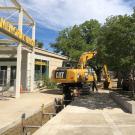 Excavating a trench between East Quad and the Memorial Union