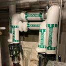 Hot water pipes installed in the Veihmeyer Hall mechanical room